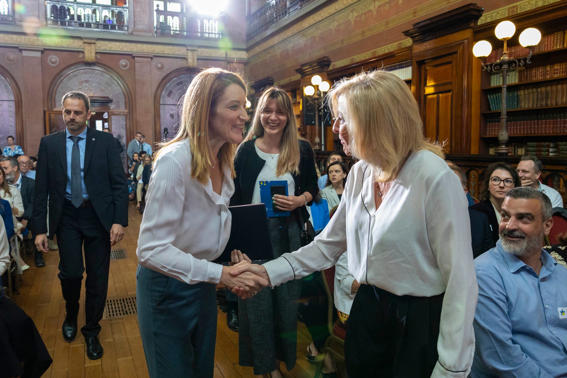Trousers, Smile, Outerwear, Gesture, Tie